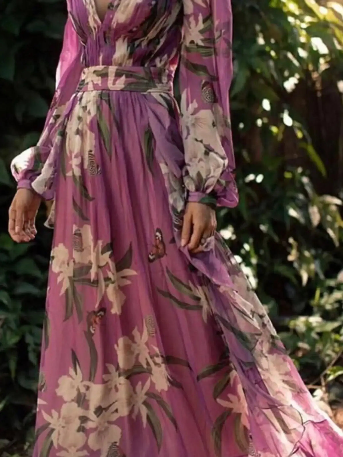 Purple floral maxi dress with long sleeves and butterfly print, perfect for elegant outdoor wear.