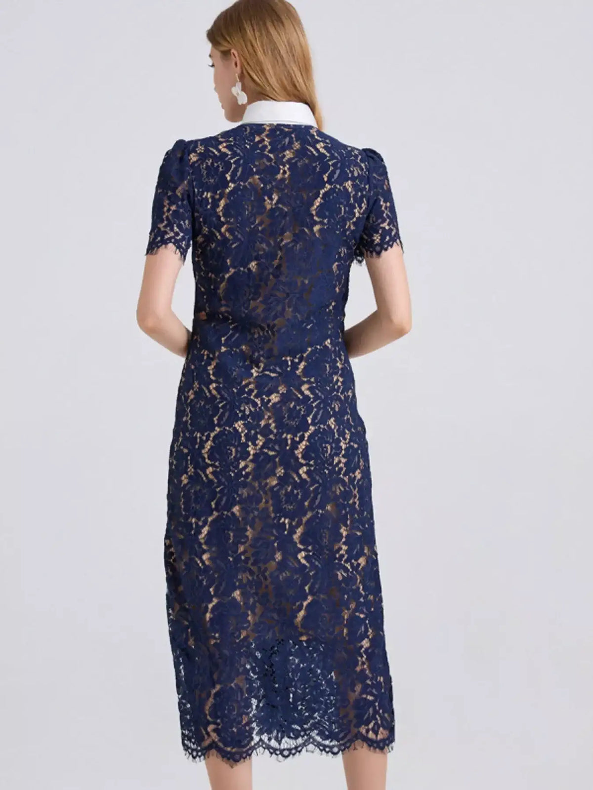 Back view of the navy lace button-down midi wedding guest dress
