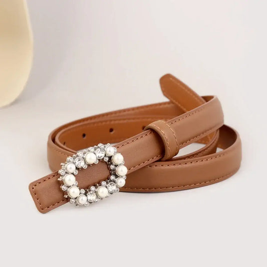 Tan faux leather women's belt with an oval pearl and rhinestone buckle