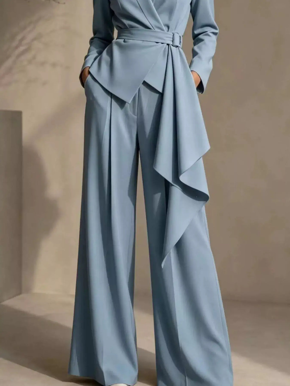 Evie's Dreamland light blue belted blazer and wide-leg pants set for women.