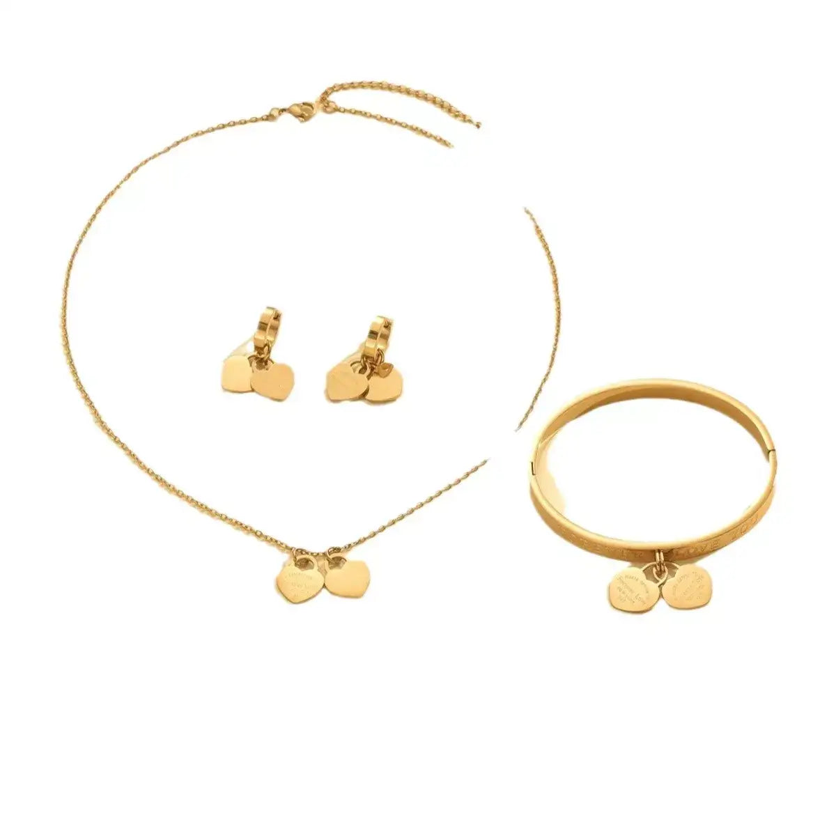 Evie's Dreamland 18K gold-plated heart jewelry set featuring a necklace, stud earrings, and a bangle.