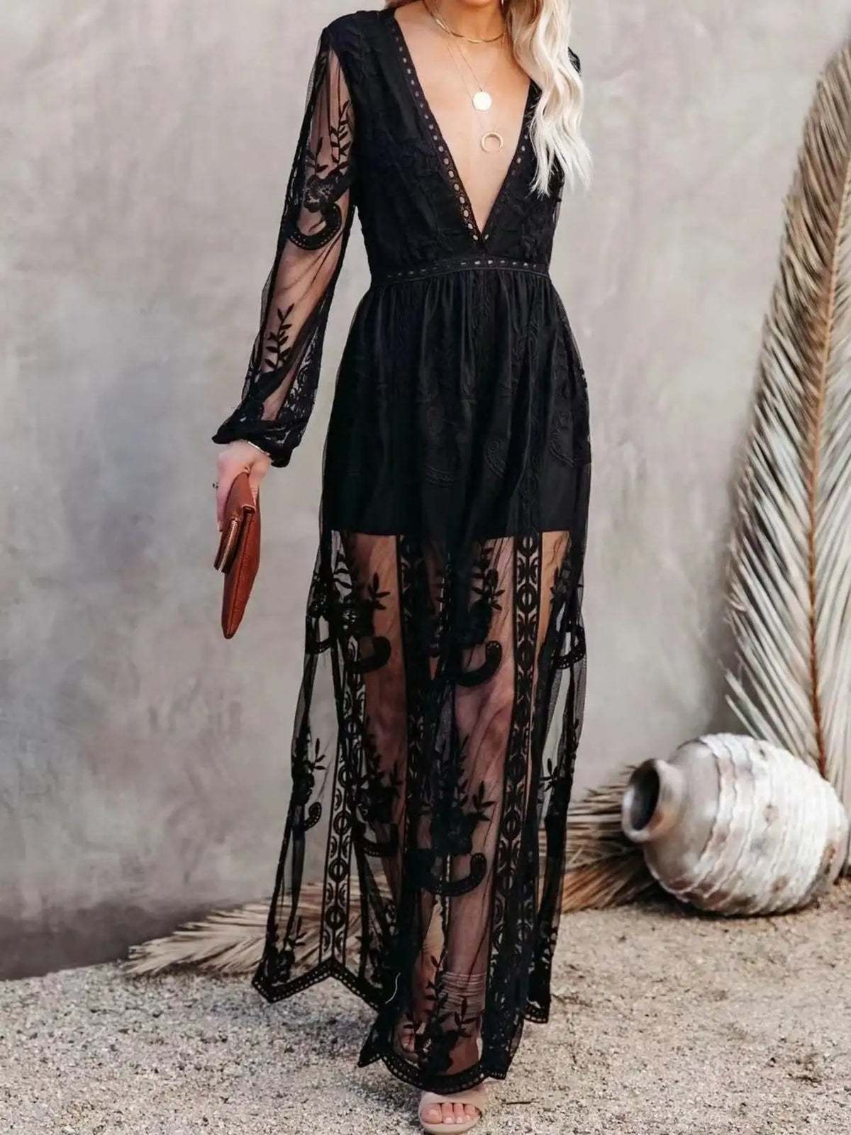 Woman in a floral lace maxi dress with a thigh slit by Evie's Dreamland
