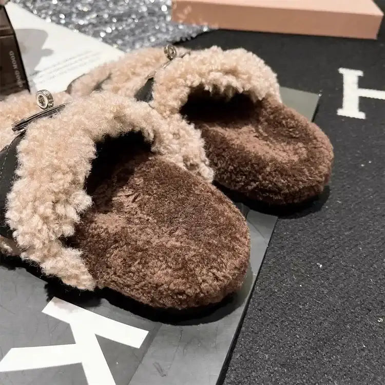Brown fuzzy plush faux fur slippers with black buckle straps from Evie's Dreamland.