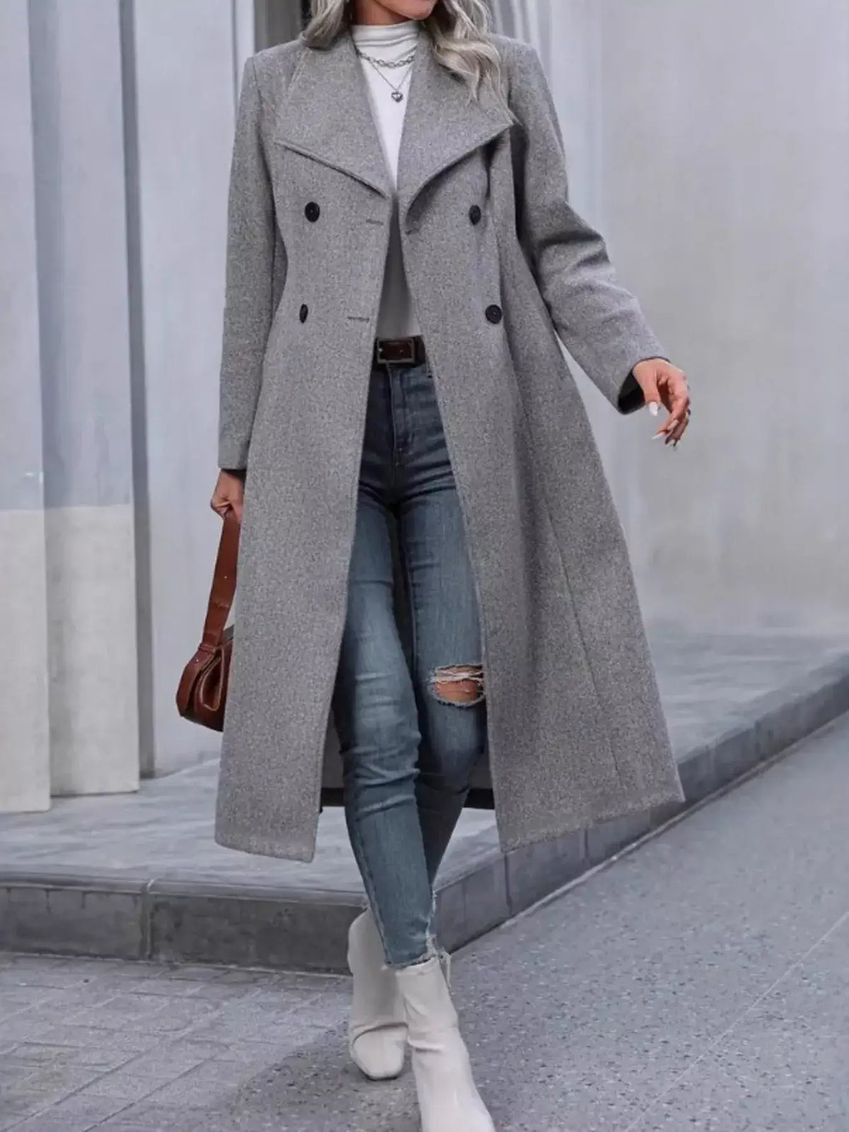 Women's longline coat styled for an elegant fall outfit