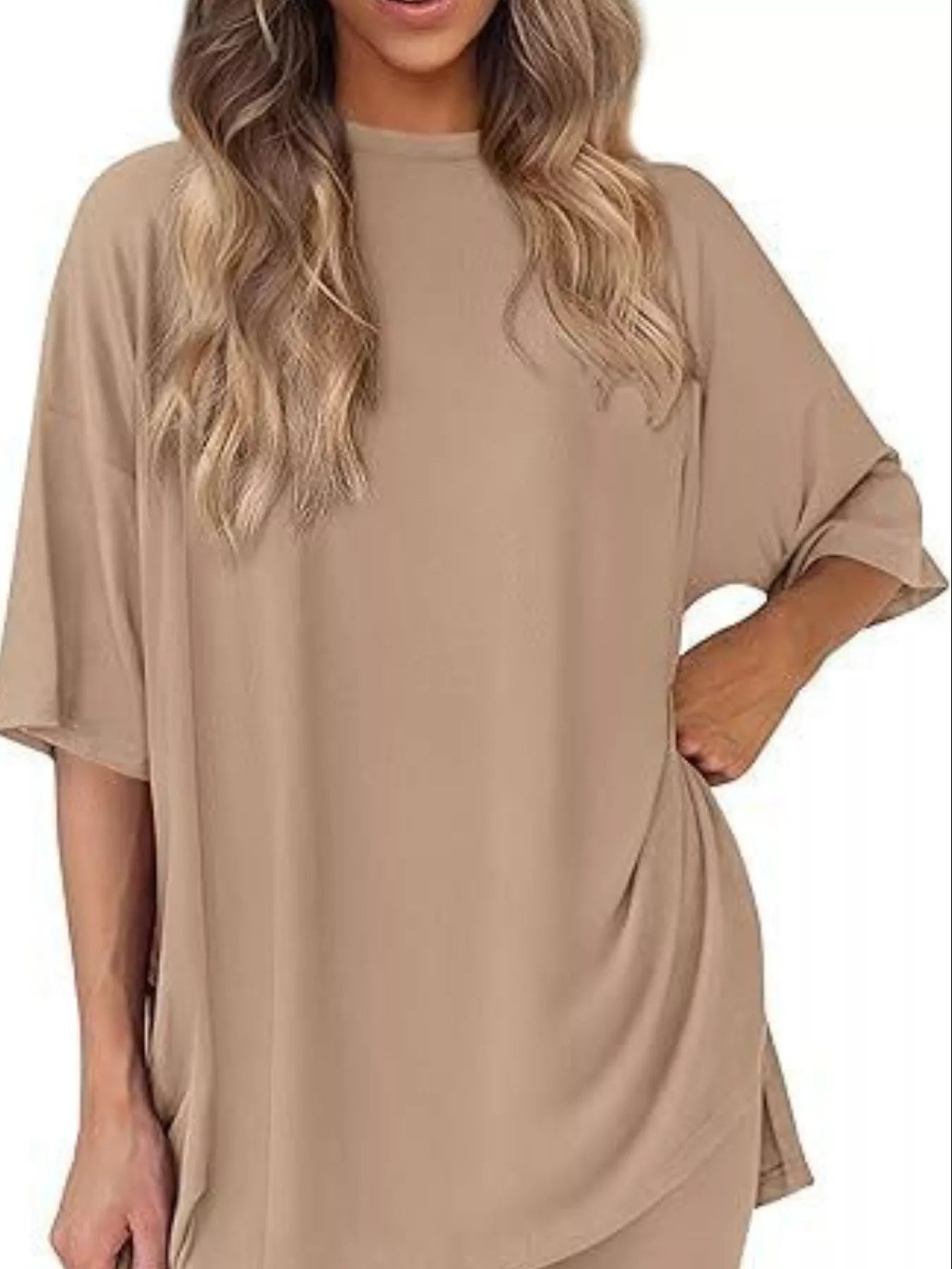 Woman wearing loose fit beige oversized t-shirt, casual women's apparel