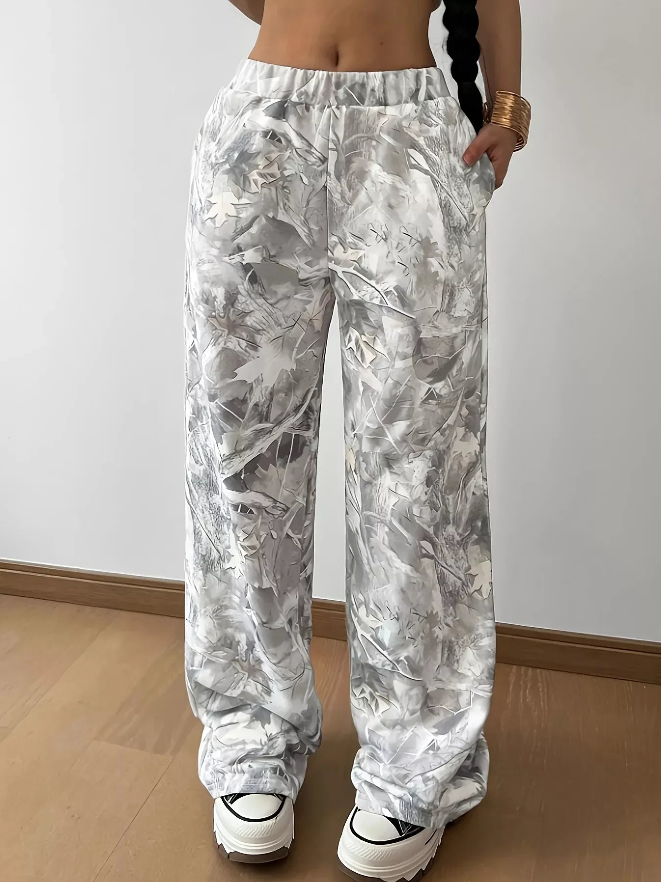 Women's casual wide-leg pants with light gray abstract leaf pattern and elastic waistband