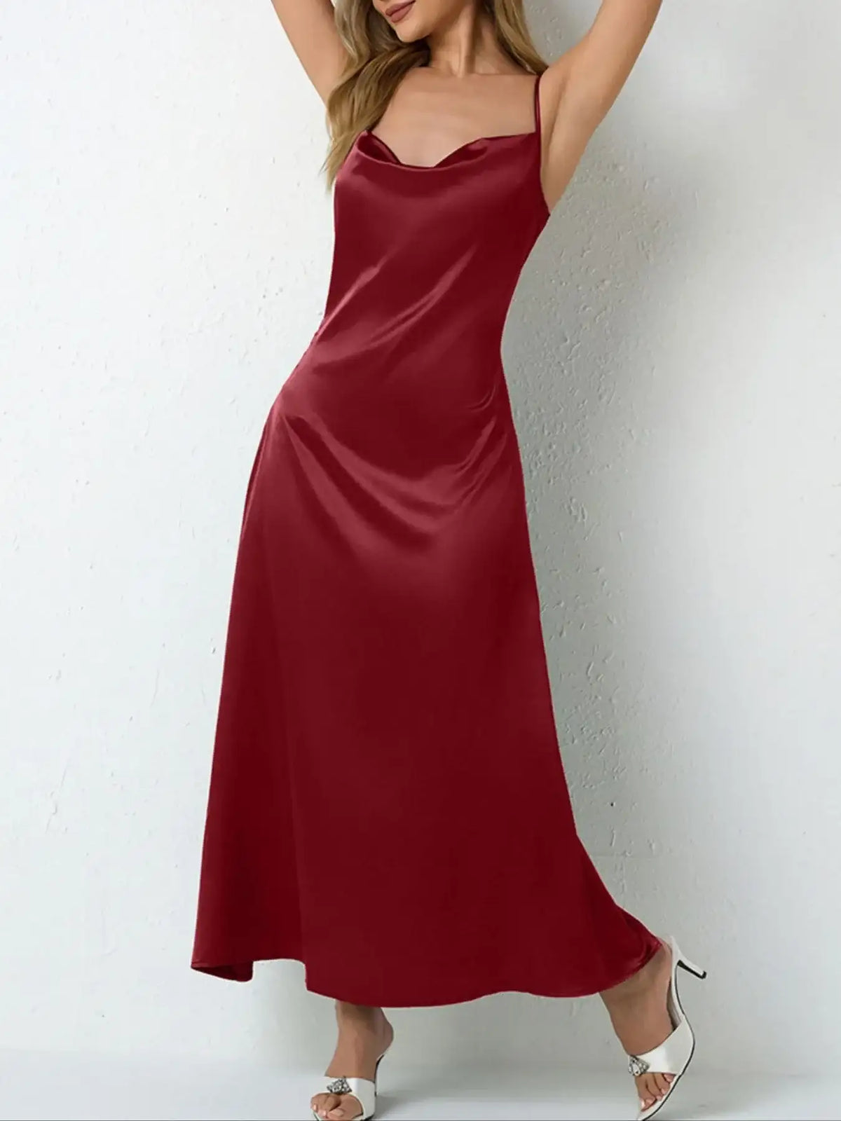 Evie's Dreamland burgundy satin cowl neck slip maxi dress with thin straps and a flowing fit.