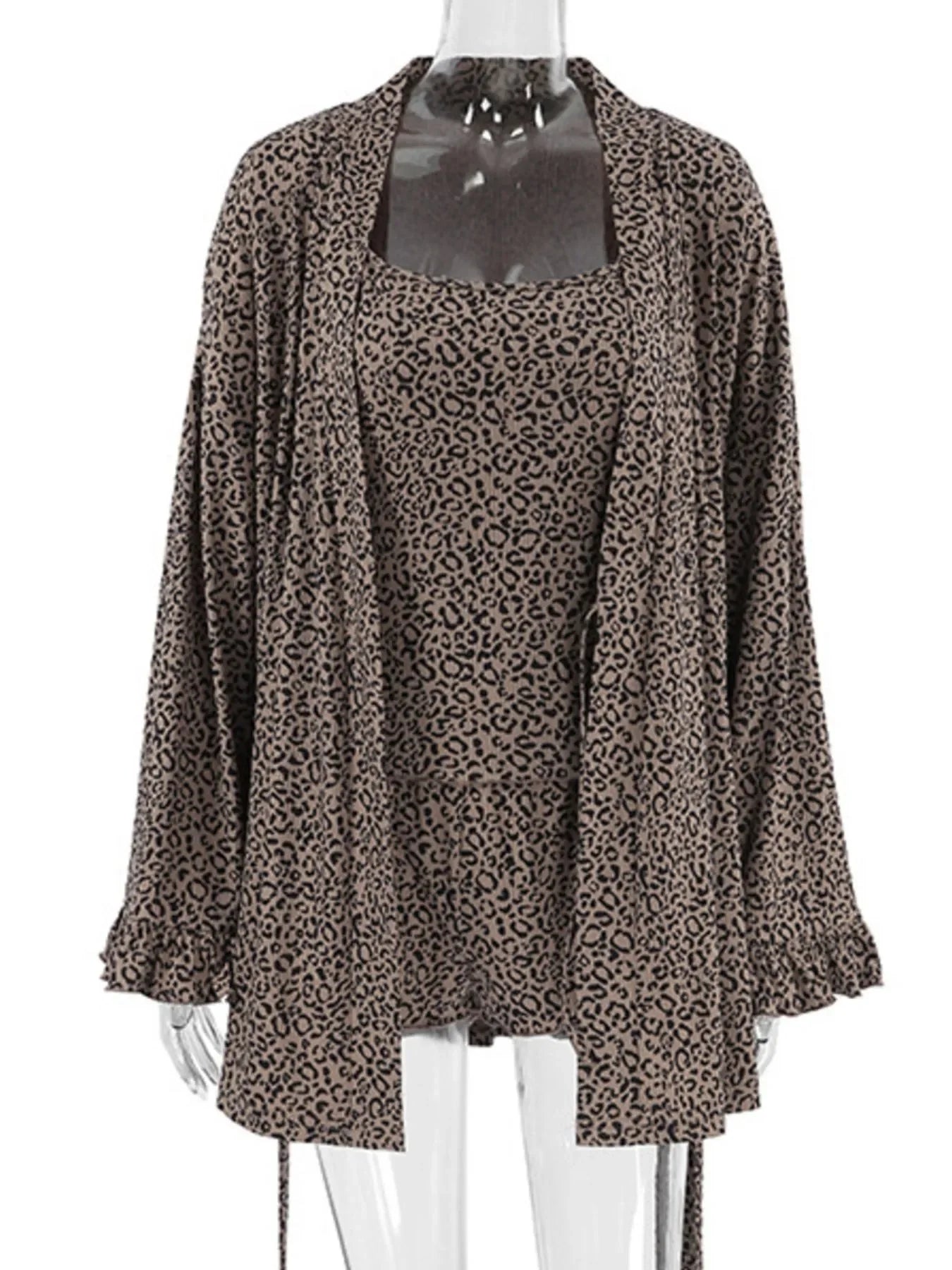 Leopard print women's cardigan and matching top set with long sleeves on transparent mannequin