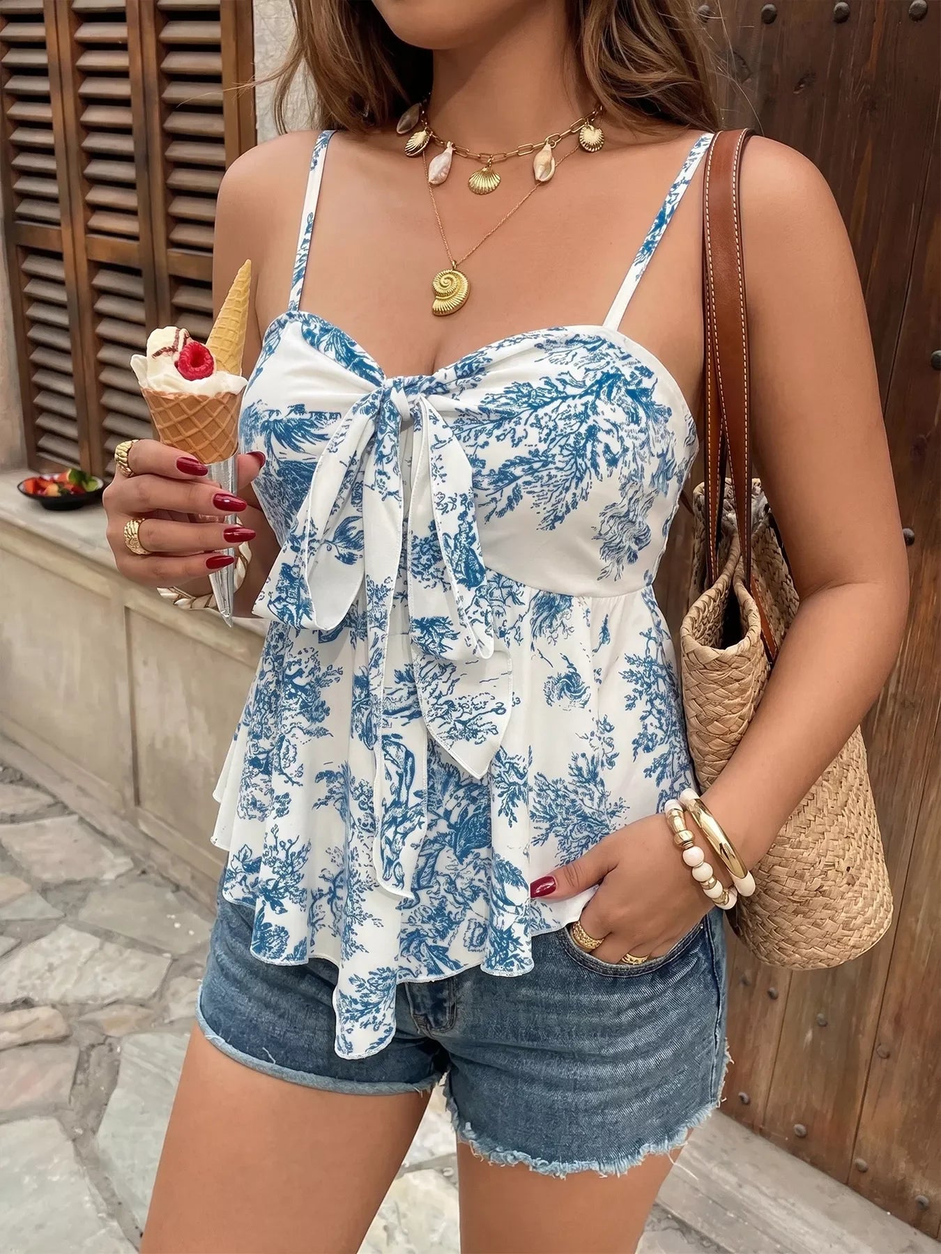 Floral tie-front ruffle-hem cami, close-up of tie detail