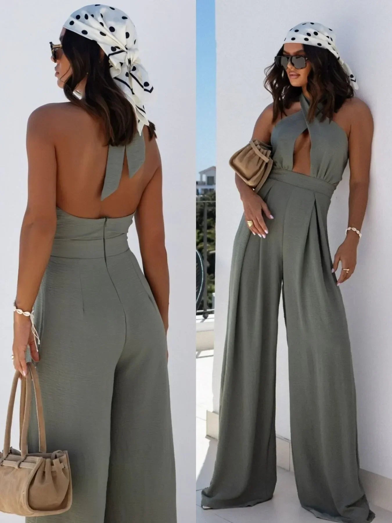 Woman wearing sleeveless olive green jumpsuit with wide legs and halter neckline, accessorized with polka dot headscarf, sunglasses, and beige handbag