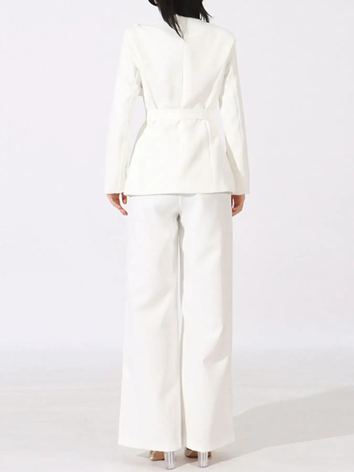 Rear view of Evie's Dreamland white double-breasted blazer and wide-leg pants set.