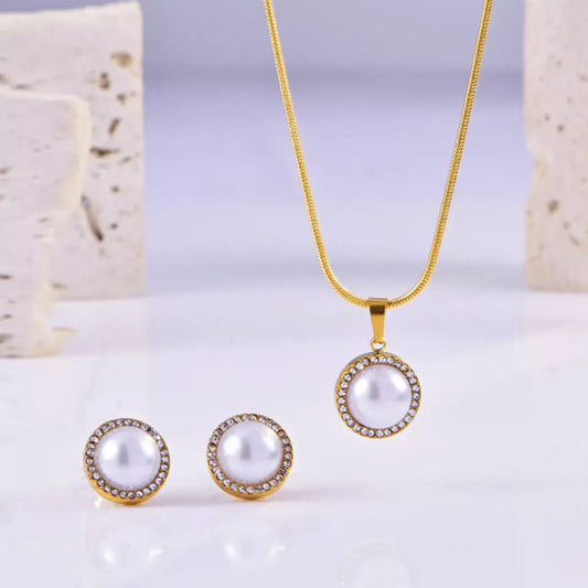Evie's Dreamland 18K gold-plated pearl and rhinestone necklace and earring set.
