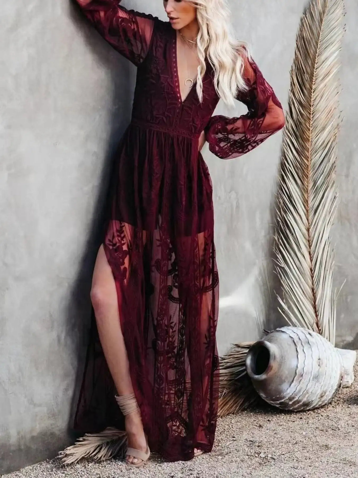 Woman in a floral lace maxi dress with a thigh slit by Evie's Dreamland