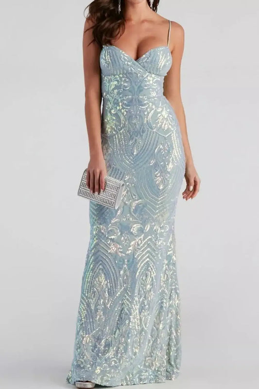 Woman wearing a sky blue sequin mermaid maxi gown with cami straps from Evie's Dreamland