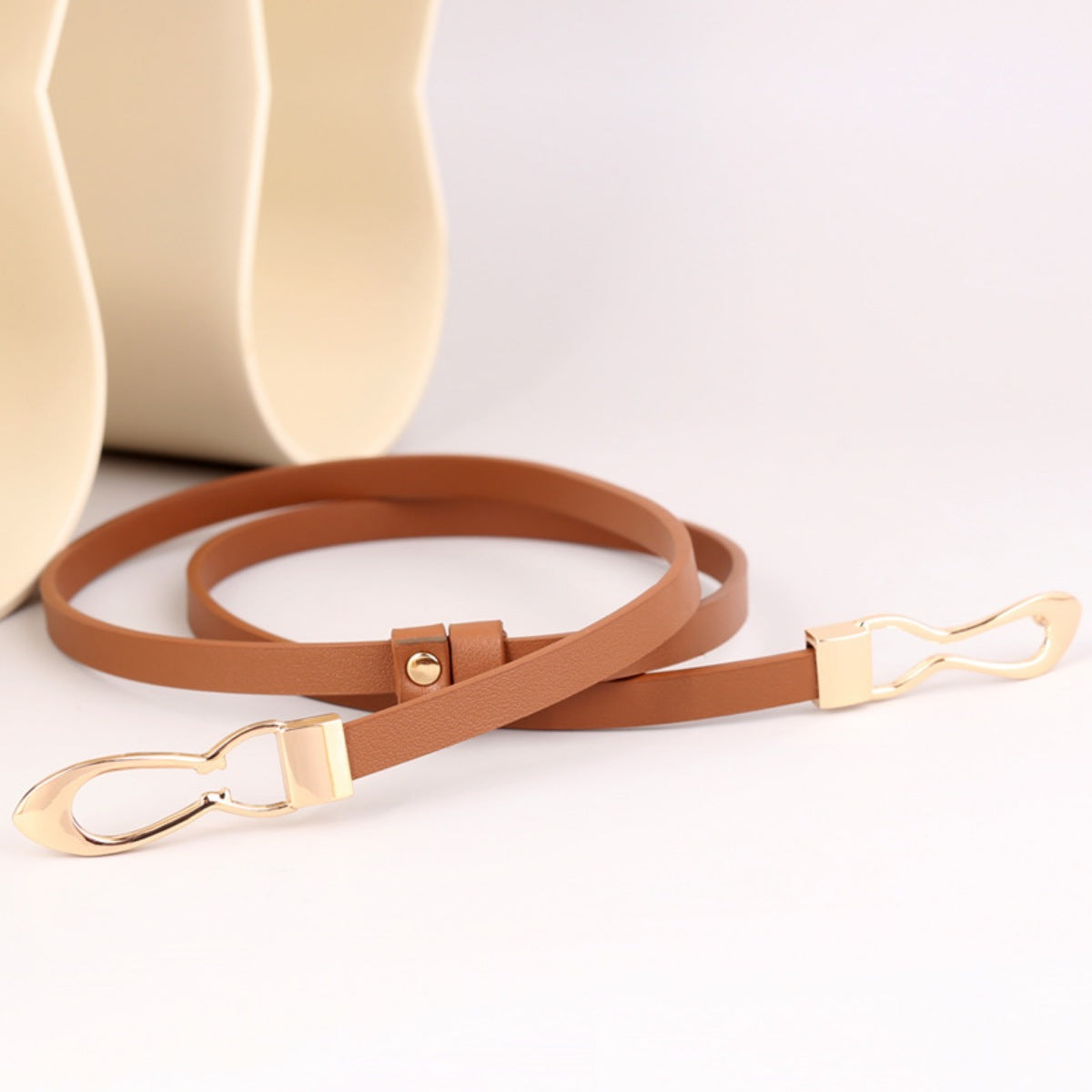 Brown faux leather handbag strap with gold-tone metal clasps