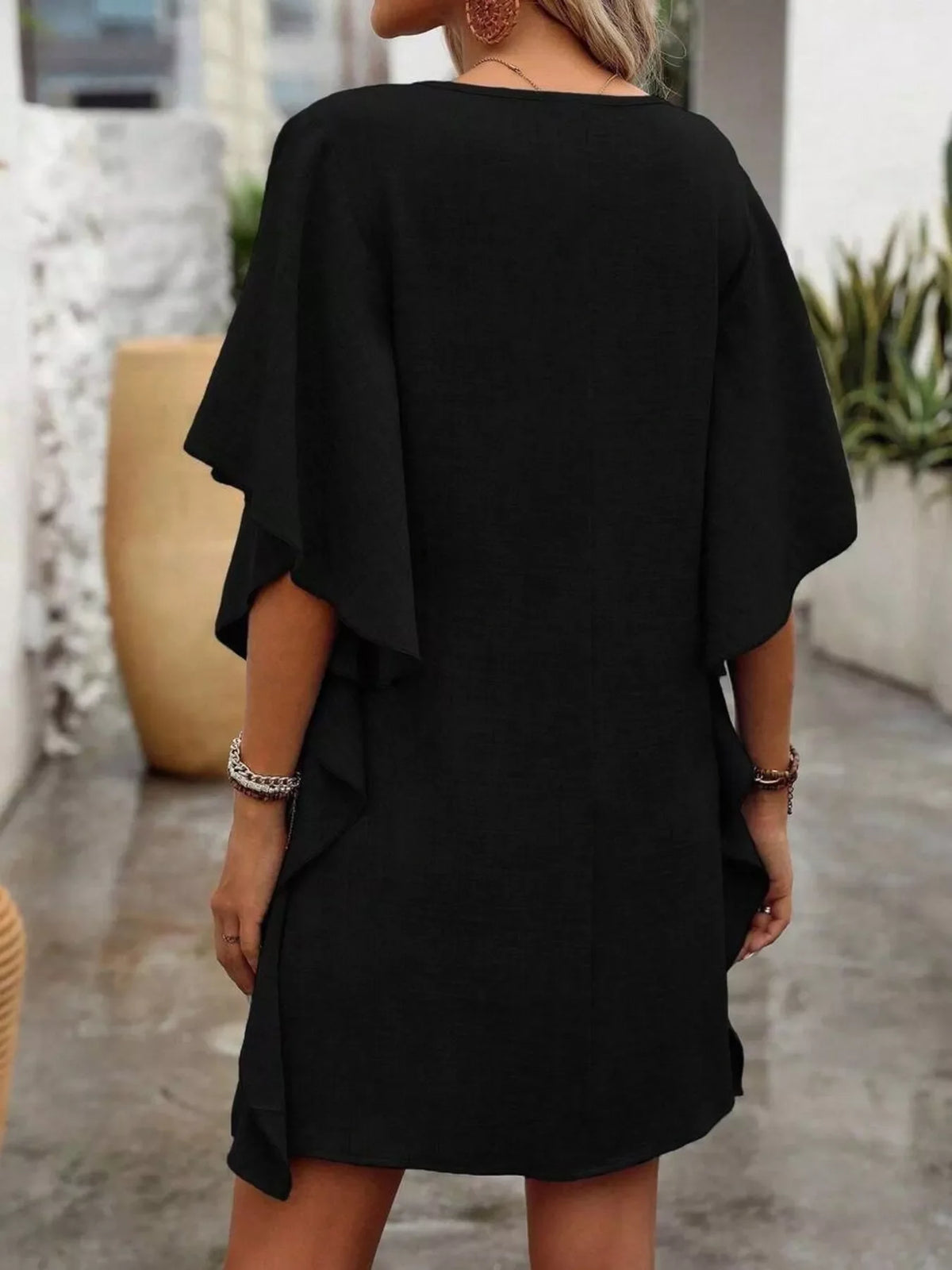 Ruffled flutter-sleeve mini dress, side view