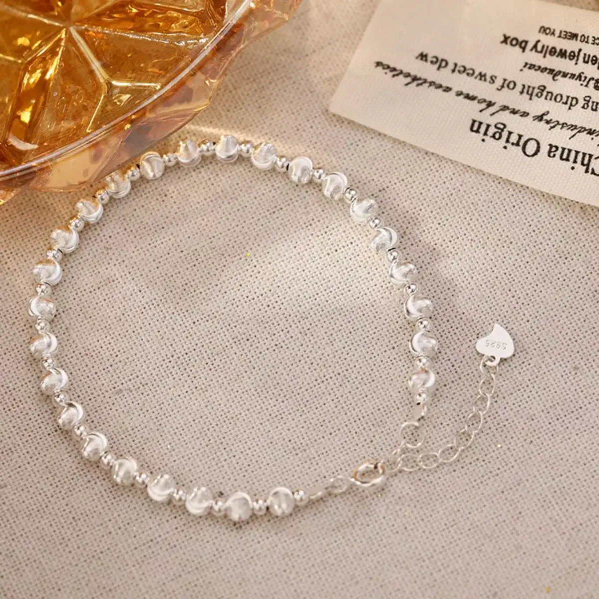 Trendsi 925 sterling silver beaded bracelet for women featuring a heart-shaped charm tag.