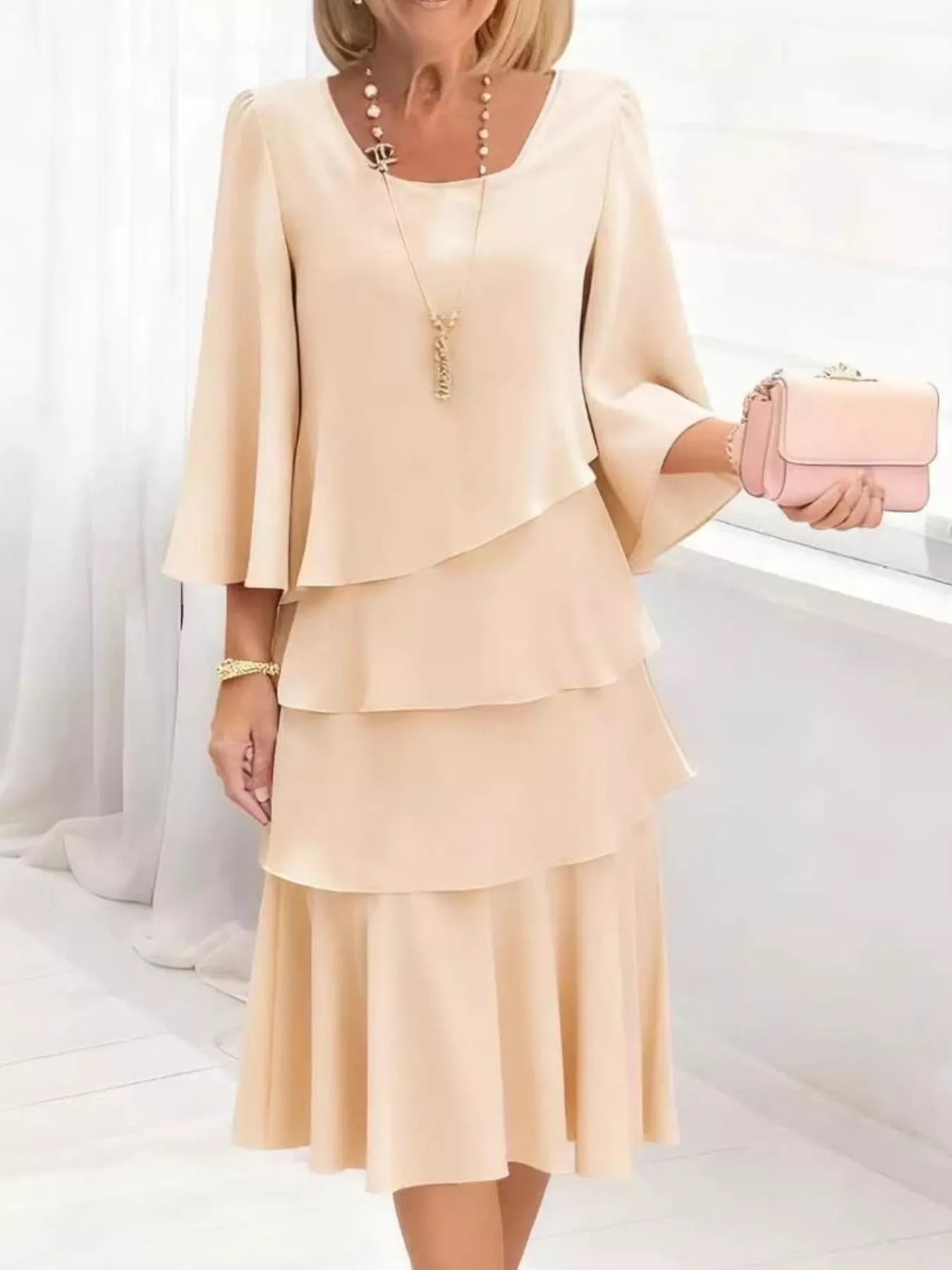 Elegant beige ruffled tiered dress with bell sleeves, paired with pearl necklace and pink clutch for chic everyday style