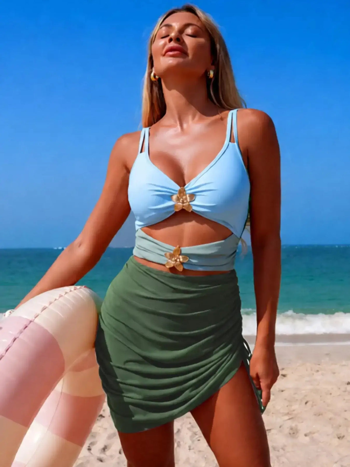 Flattering color block one-piece bathing suit for the pool and beach.