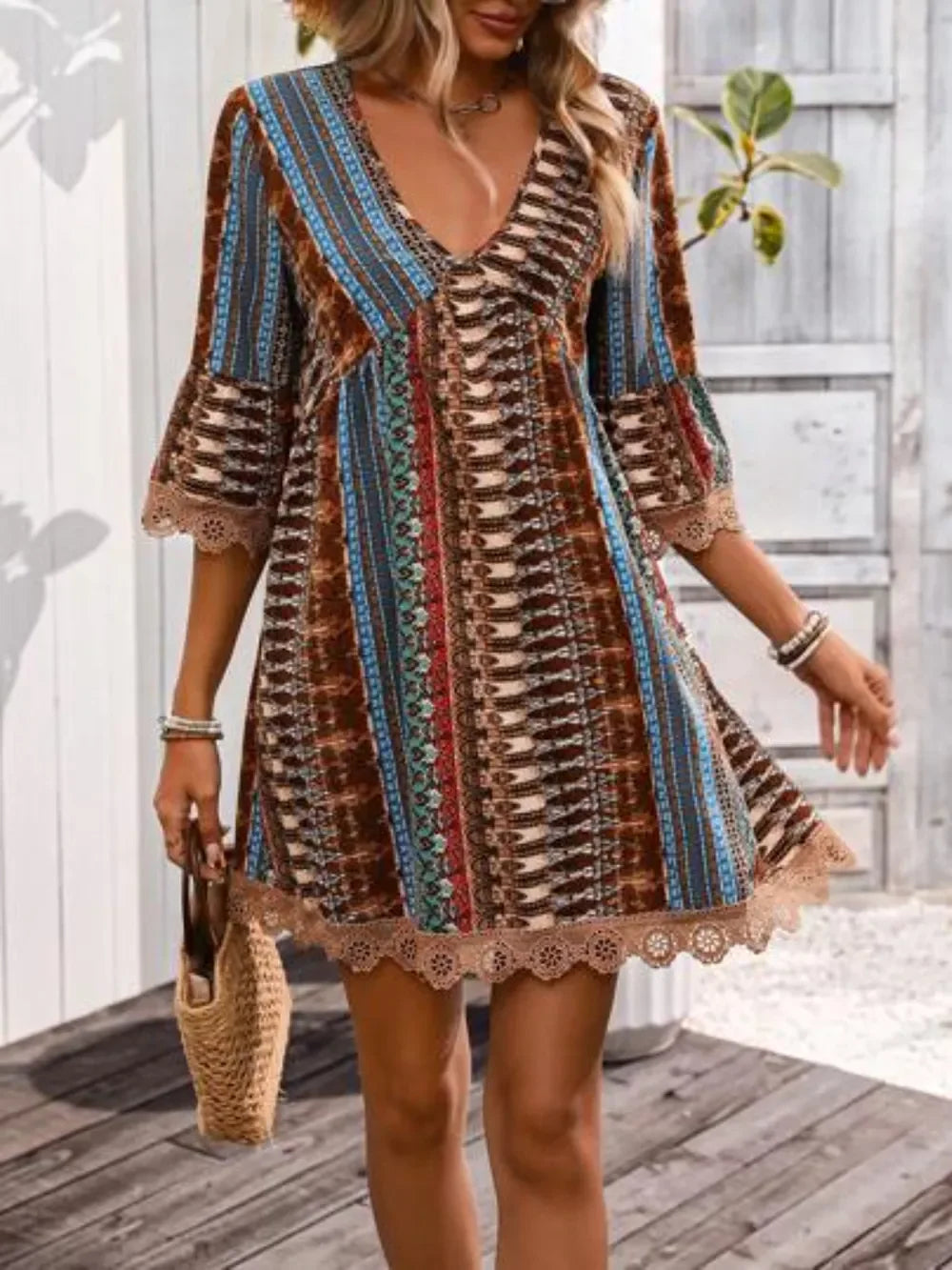 Printed boho mini dress with lace-trim sleeves, detail view