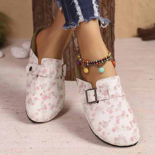 Women's floral print slip-on flats with buckle detail, front view