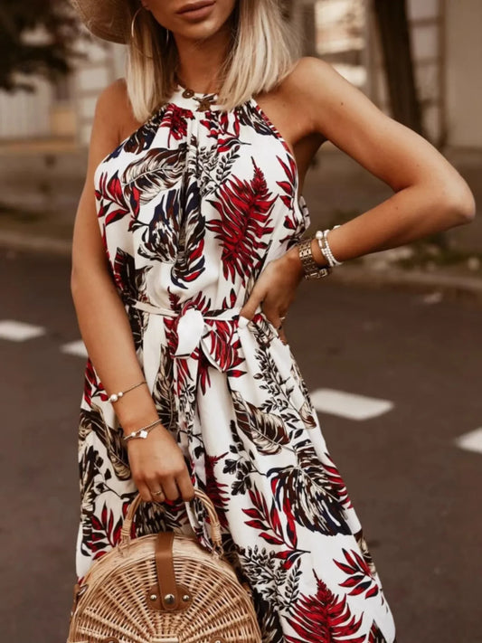 Tropical floral halter neck summer dress on model — vacation beach dress
