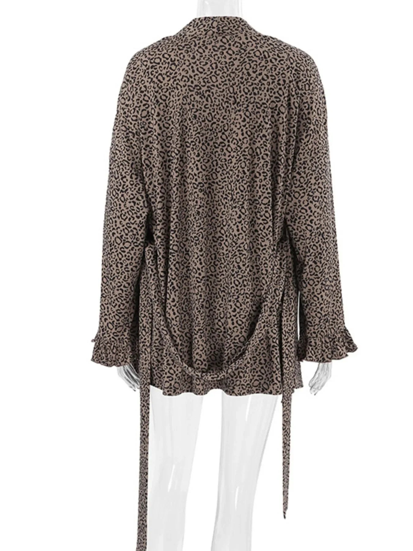 Back view of leopard print long sleeve jacket with waist ties on mannequin