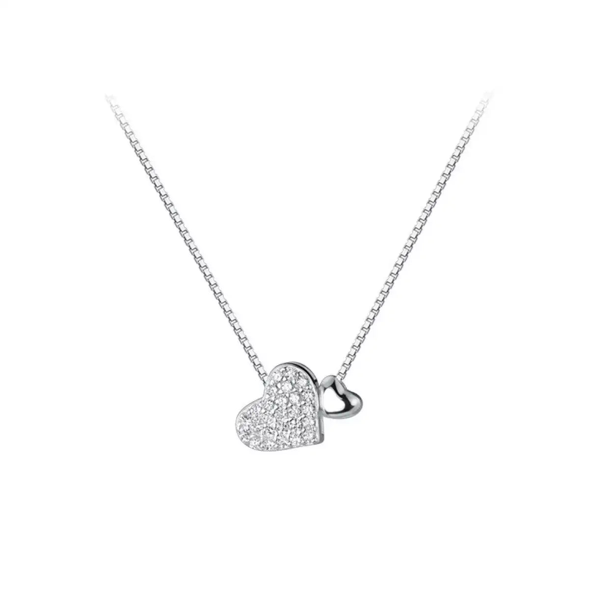 Evie's Dreamland 925 sterling silver heart necklace featuring sparkling zircon crystals on a box chain.