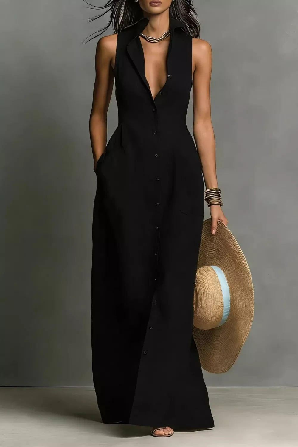 Black sleeveless button-down maxi dress with wide-brim straw hat, stylish summer outfit