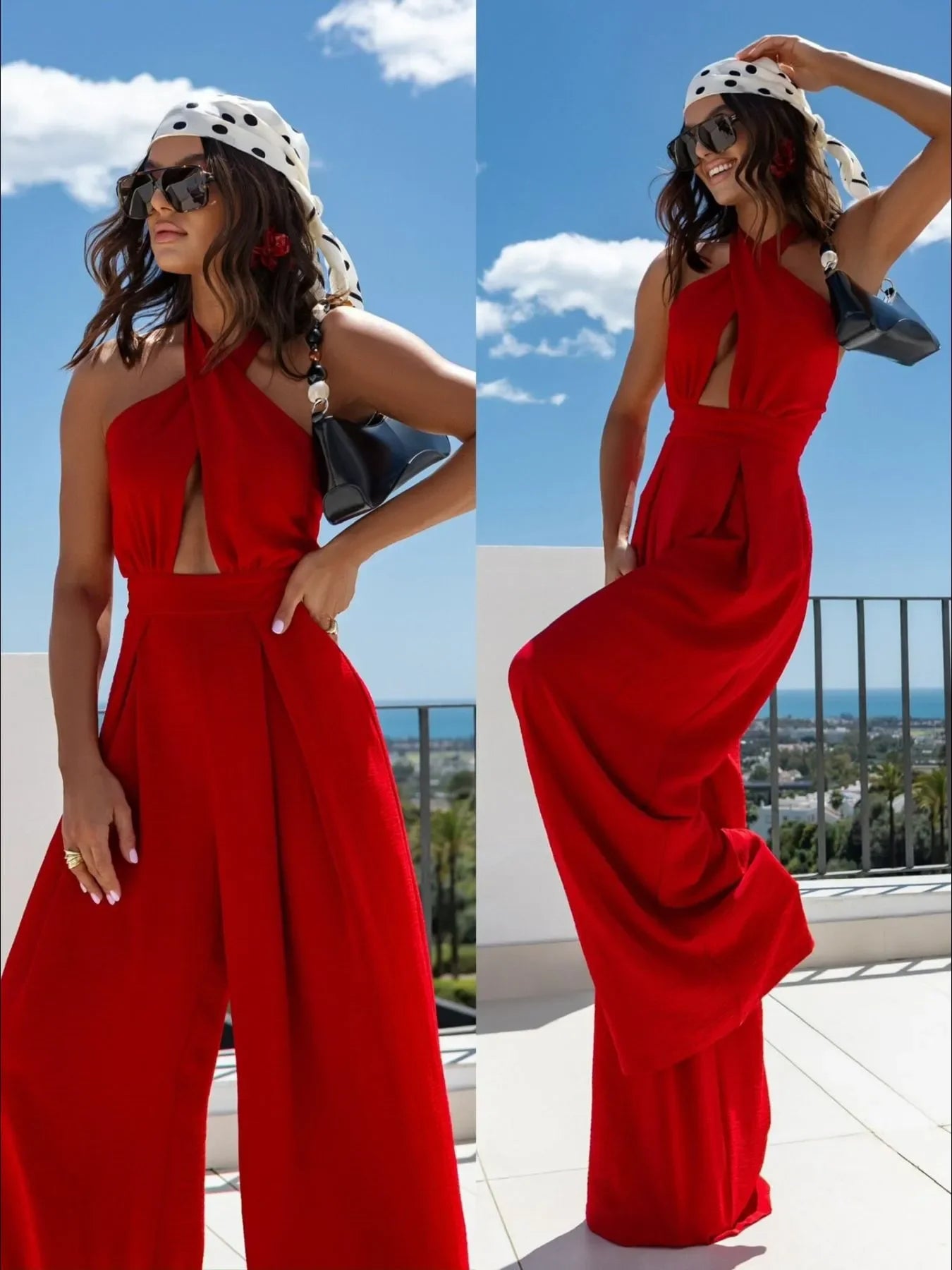 Woman in red halter wide-leg jumpsuit with cutout, polka dot headscarf, sunglasses, on sunny balcony