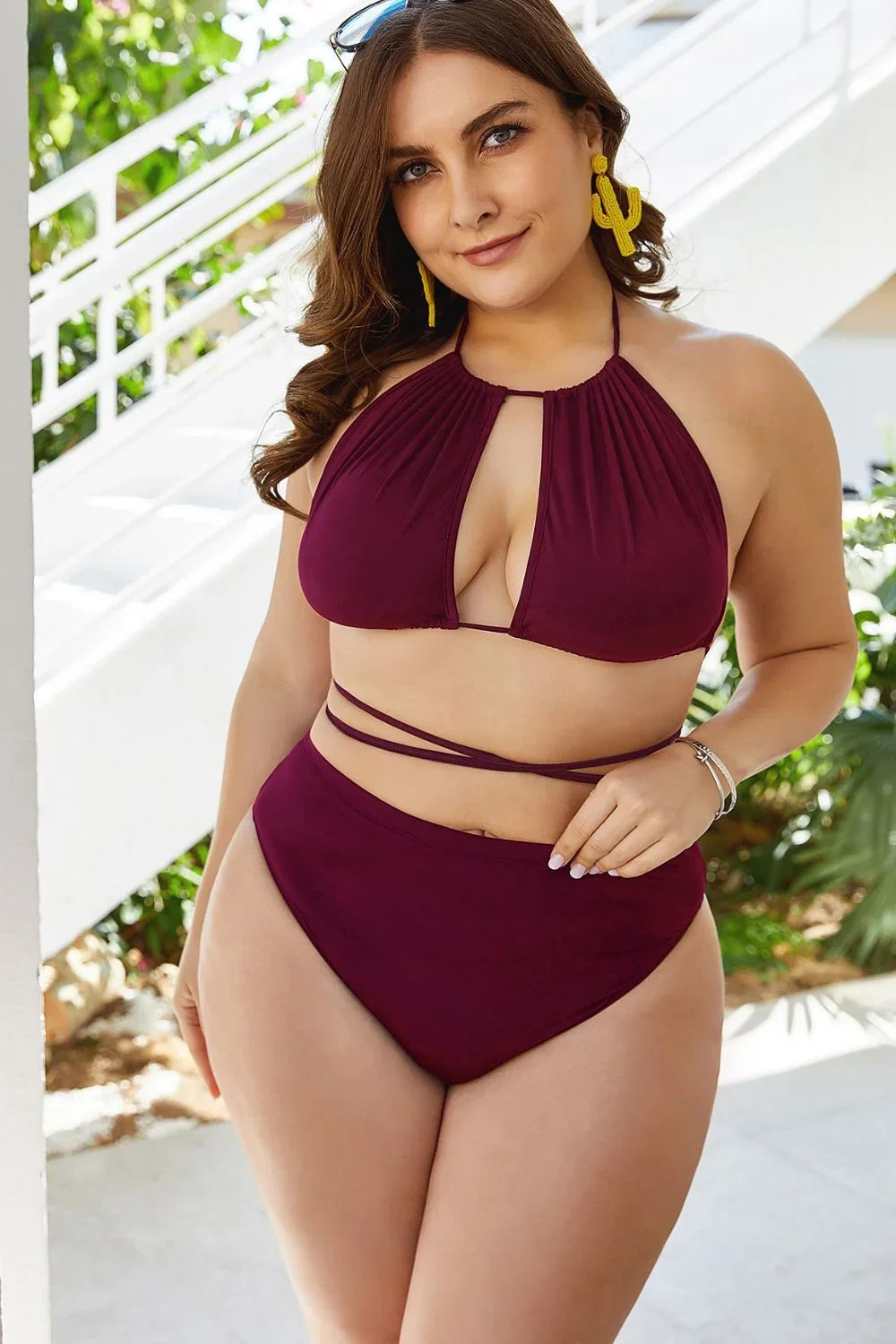 Back view of the backless bikini set showing the open-back halter design and tie detail.