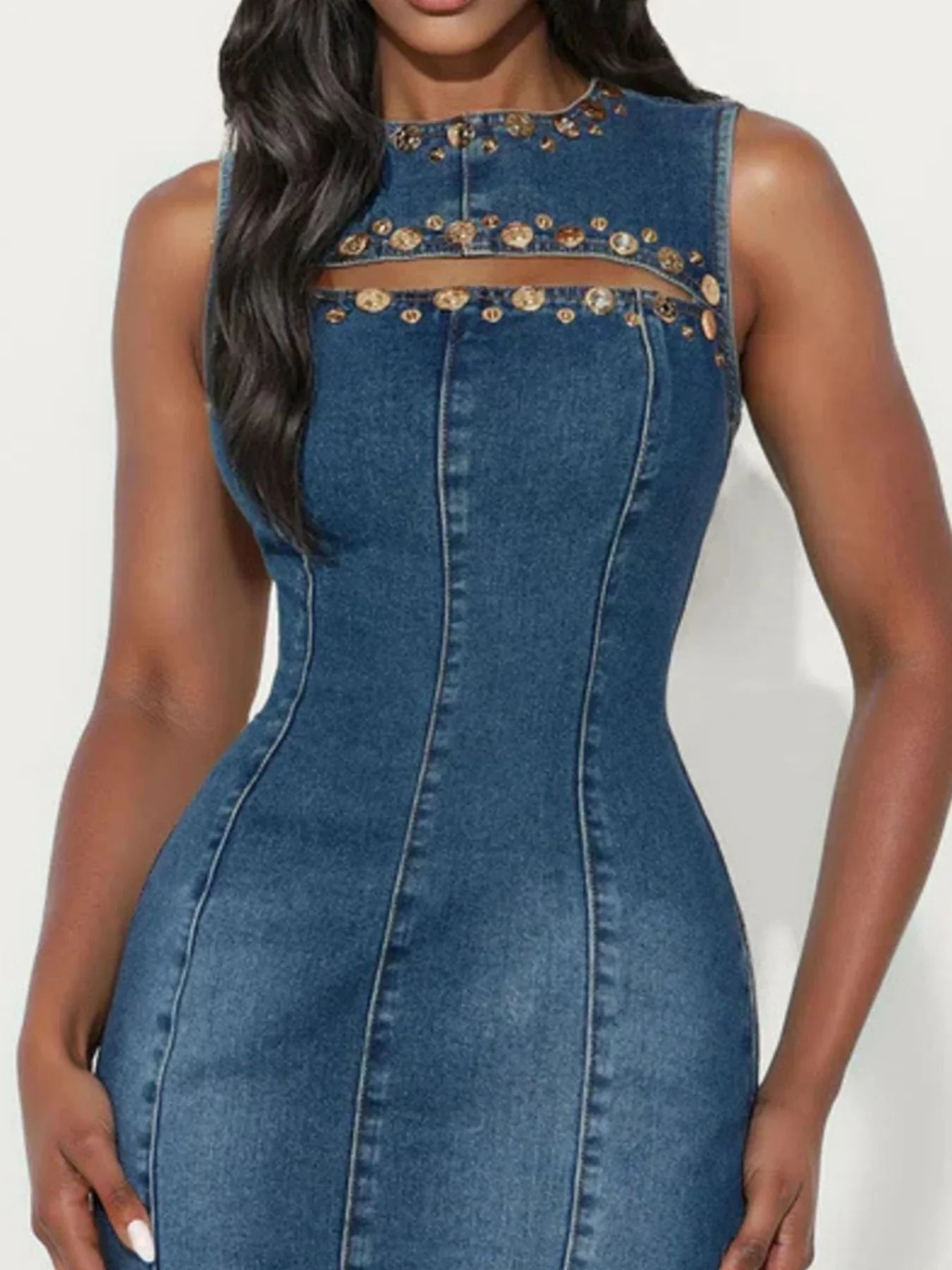 Sleeveless denim dress with gold button details and sheer neckline panel, fitted silhouette