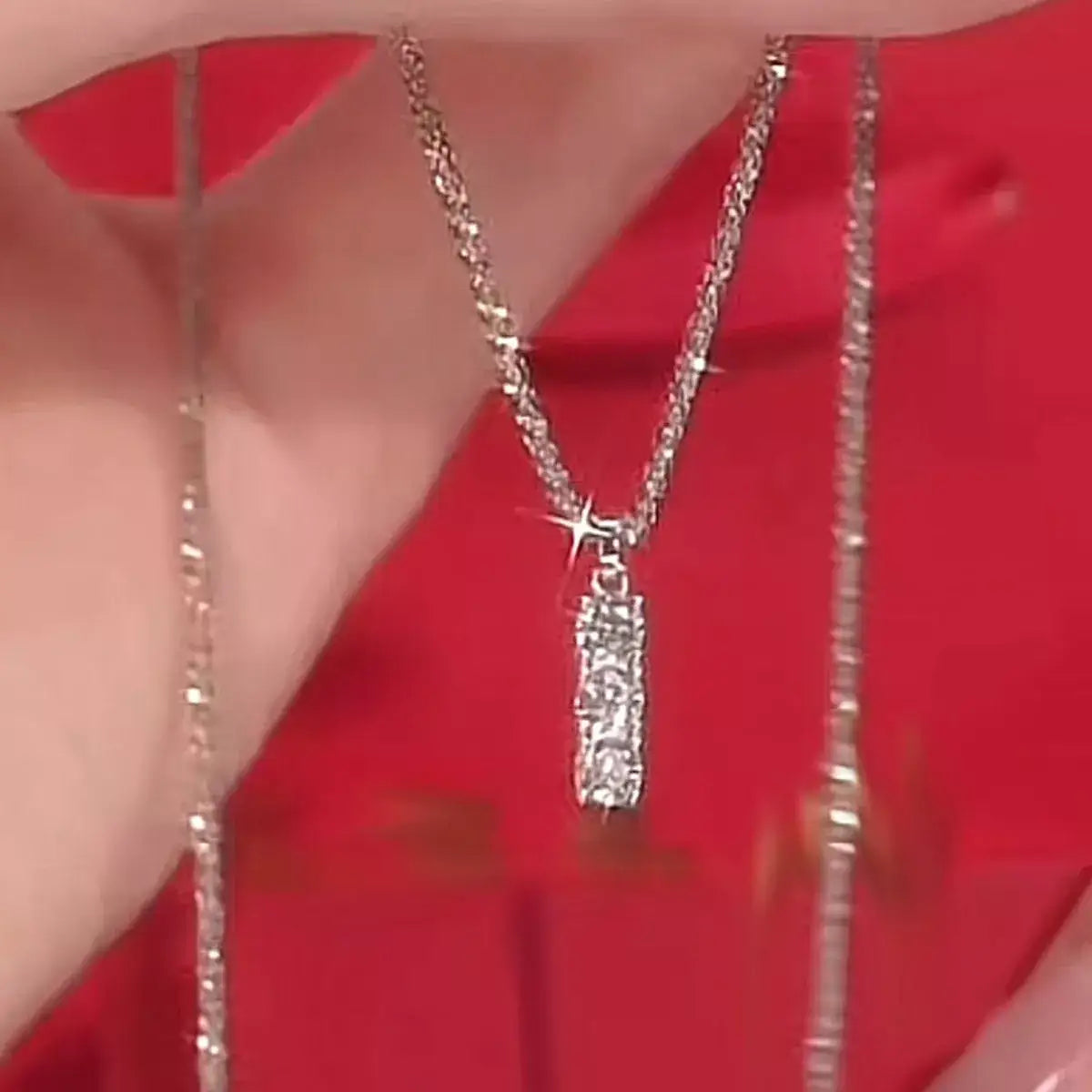 Evie's Dreamland Moissanite 925 sterling silver bar necklace with a sparkling vertical pendant.