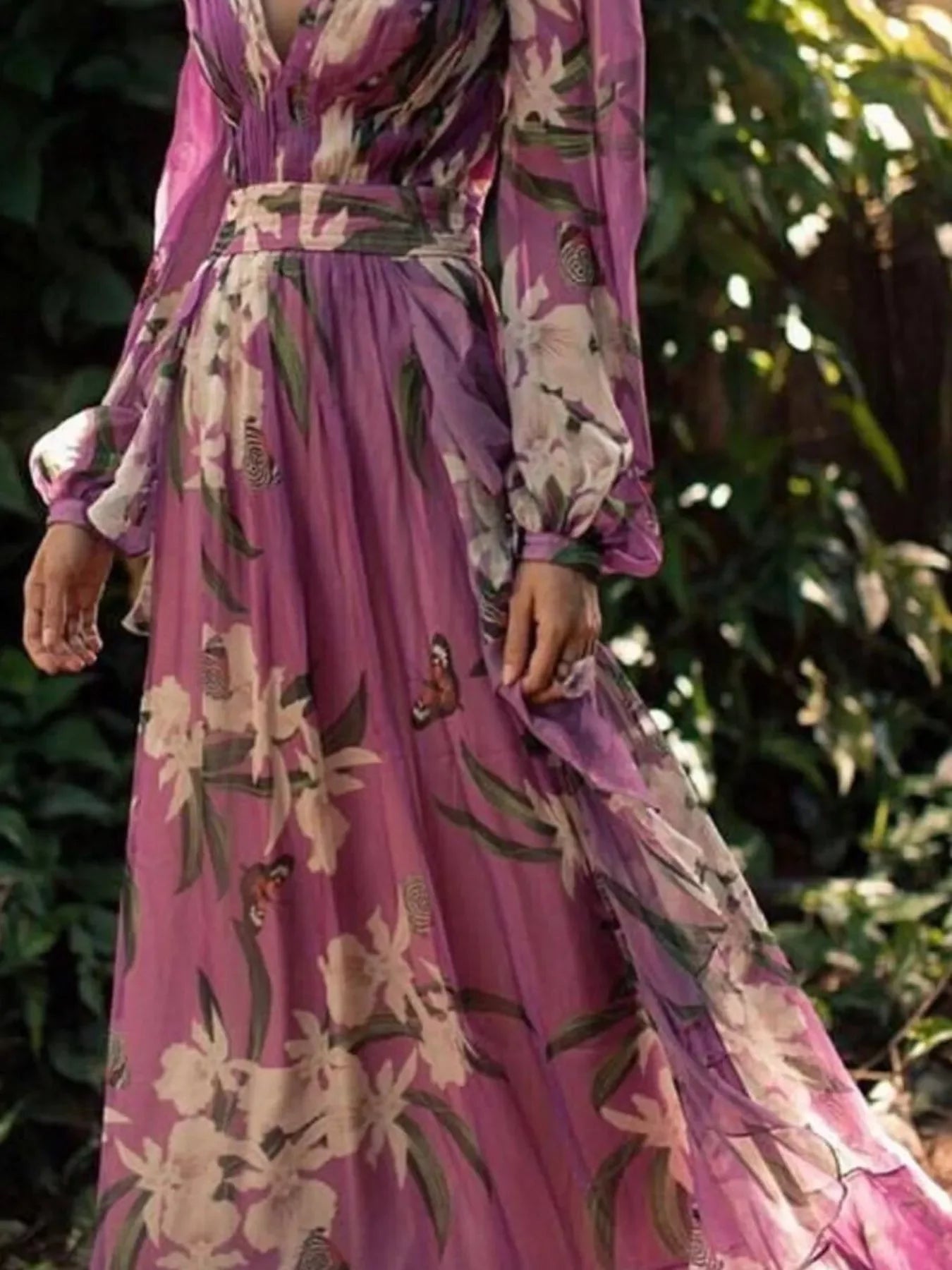 Purple floral maxi dress with long sleeves and butterfly print, perfect for elegant outdoor wear.