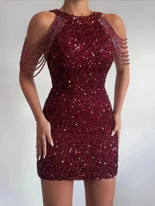 Evie's Dreamland burgundy sequin bodycon mini dress with cold shoulder beaded fringe sleeves.