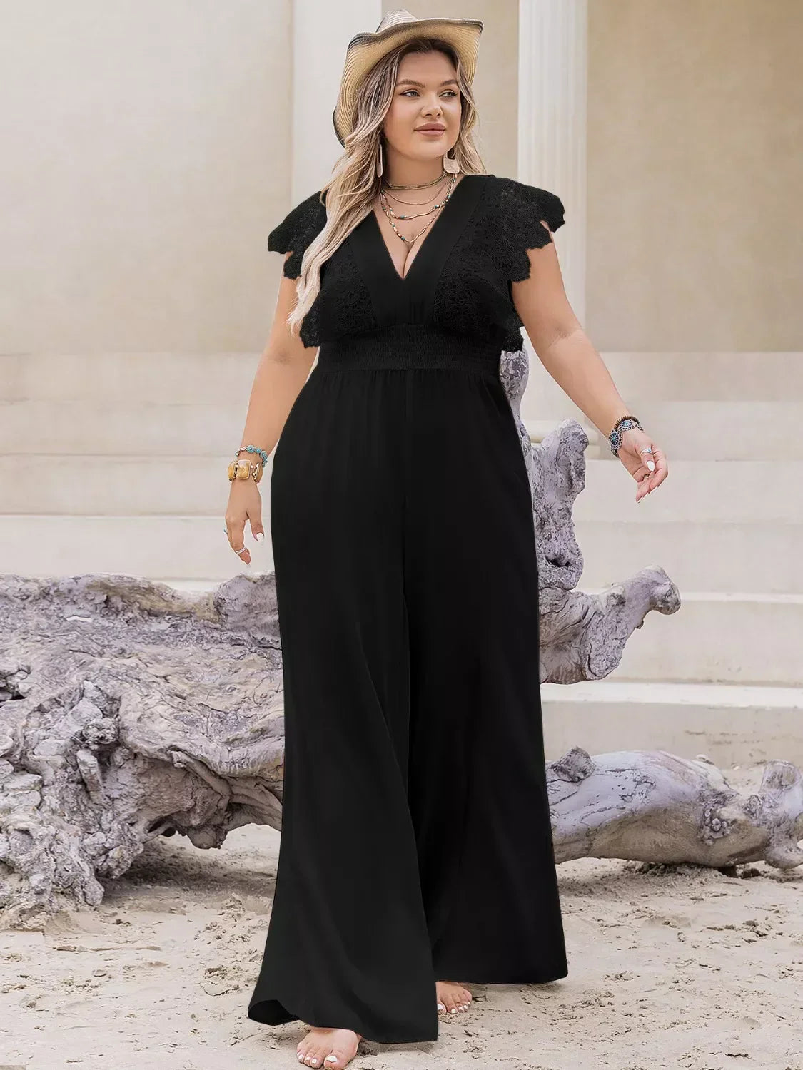 Plus size lace cap sleeve wide leg jumpsuit showcasing elegant curvy style and breathable viscose fabric