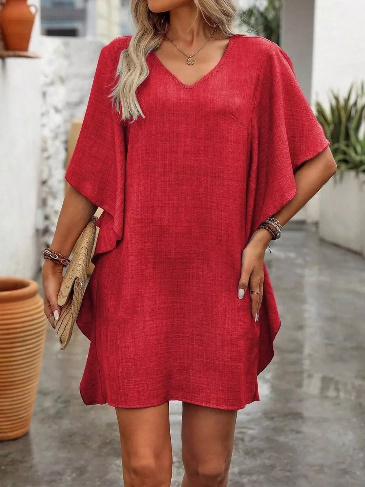 Ruffled flutter-sleeve mini dress, back view