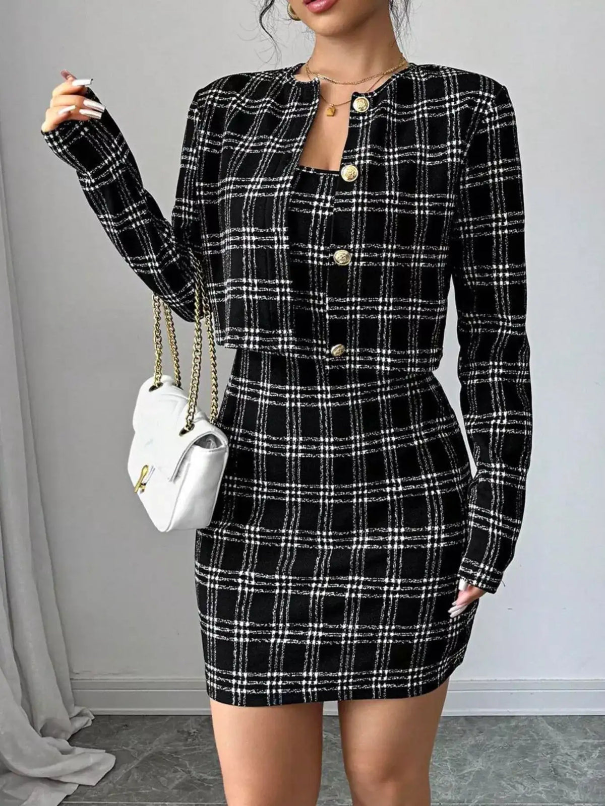 Black plaid tweed two-piece set with cropped button jacket and bodycon mini dress