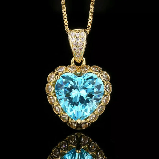 Evie's Dreamland 18K gold-plated heart-shaped aquamarine pendant necklace with a diamond-studded halo.