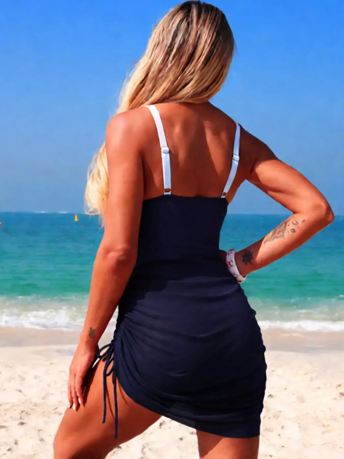 Women's color block cutout one-piece swimsuit for warm-weather days.
