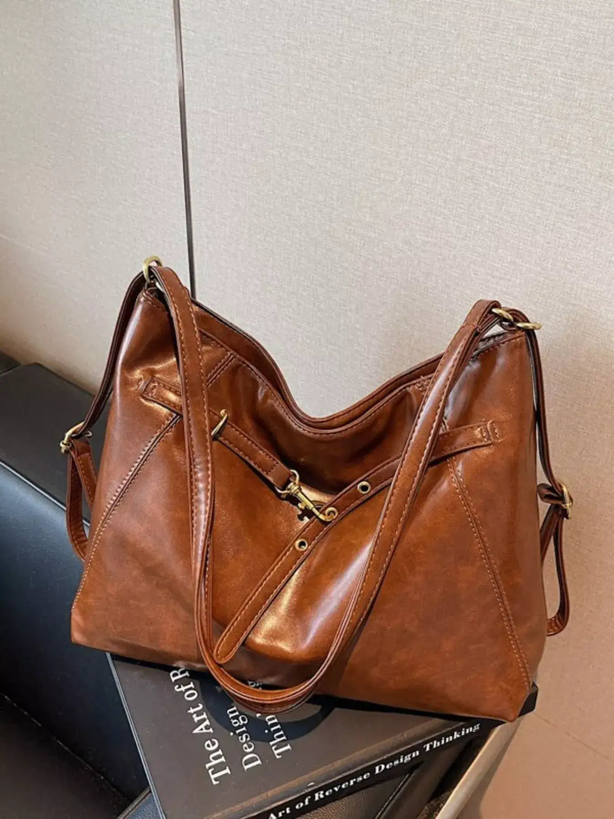 Brown vintage style PU leather crossbody shoulder bag by Evie's Dreamland.