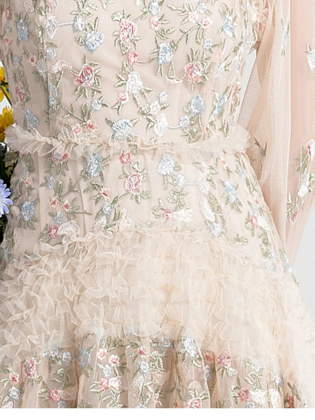 Back view of an apricot floral tulle maxi dress by Evie's Dreamland