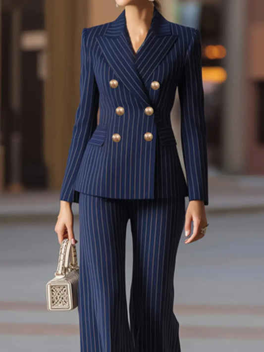 Navy blue pinstripe double-breasted blazer and wide-leg pants set by Evie's Dreamland.