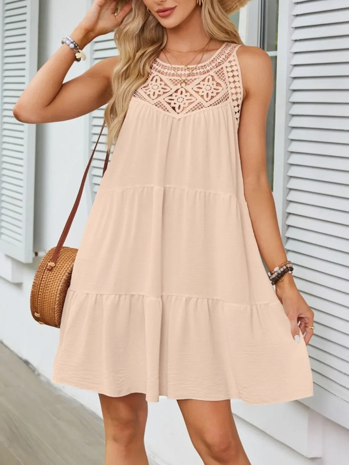 Lace sleeveless dress with ruffled hem, back view