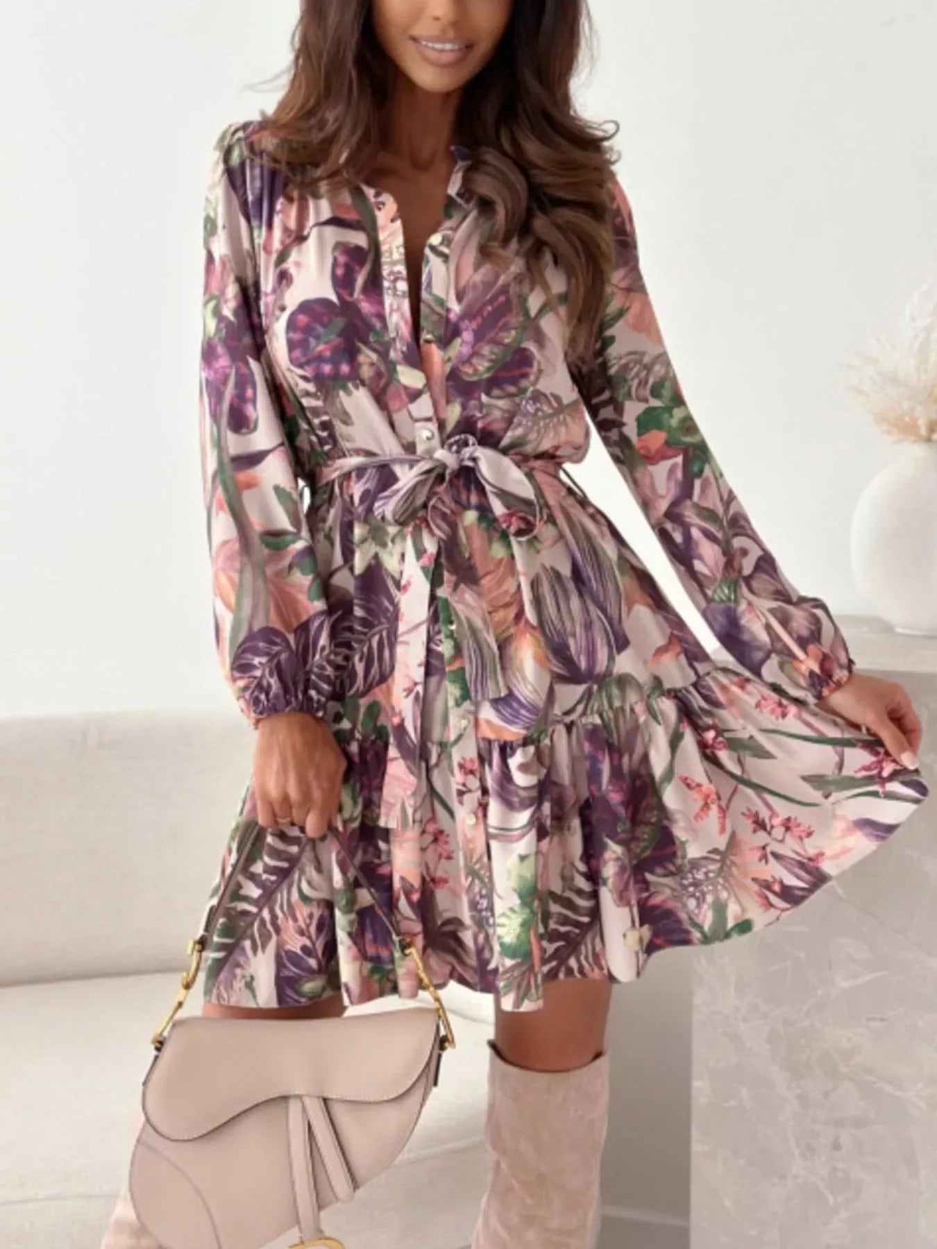 Leaf print button-front mini dress with tie waist, styled with a handbag
