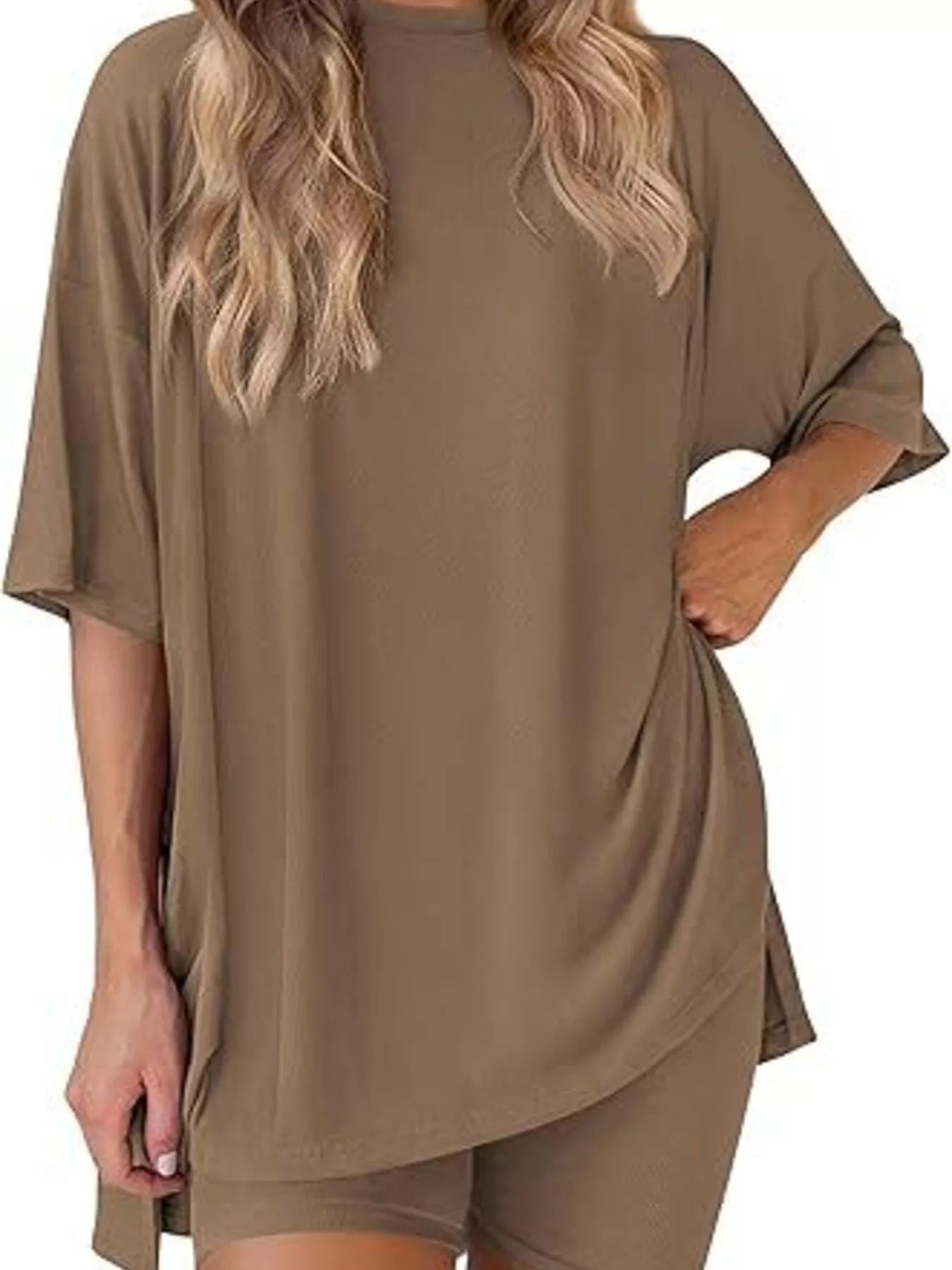 Woman wearing loose fit brown lounge set with oversized t-shirt and matching shorts