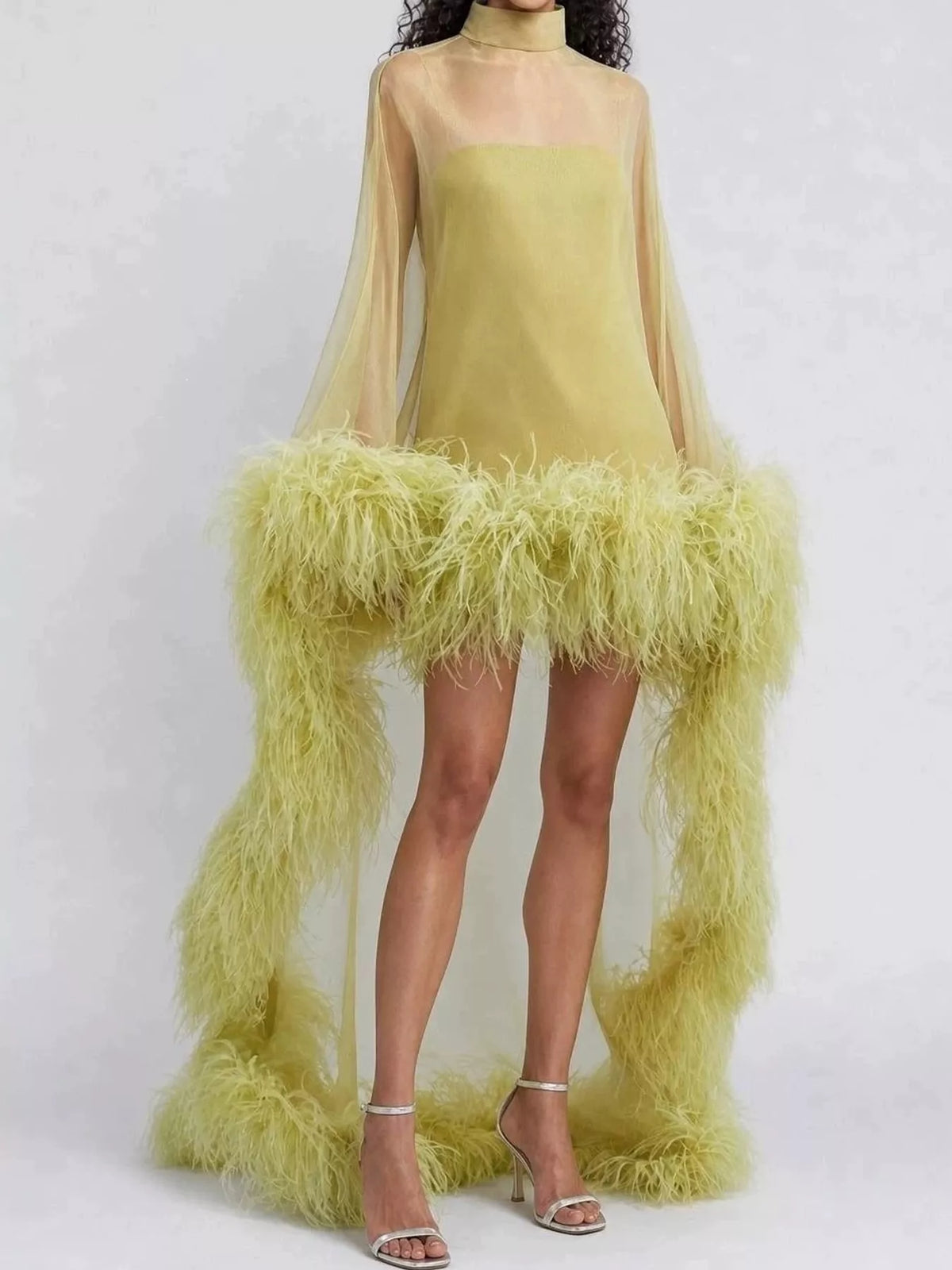 Green feather-trimmed sheer mock neck mini dress - front view