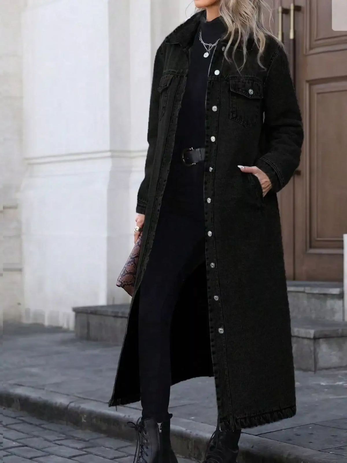 Women's black longline denim jacket from Evie's Dreamland with button-front and a relaxed fit.