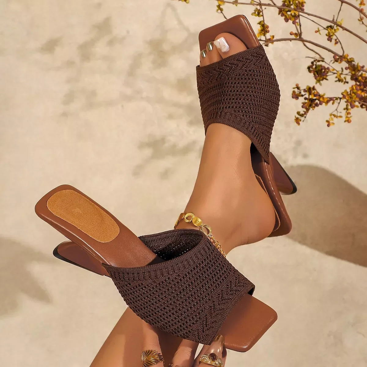 Close-up of block heel on women's mesh open toe sandals