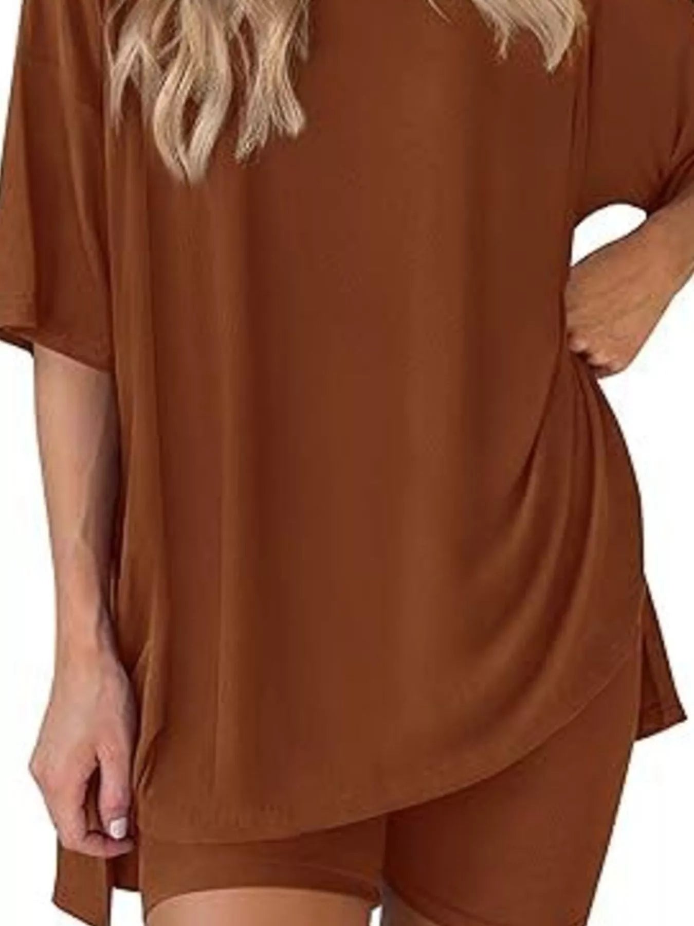 Woman wearing loose brown short sleeve top and matching shorts set, casual loungewear